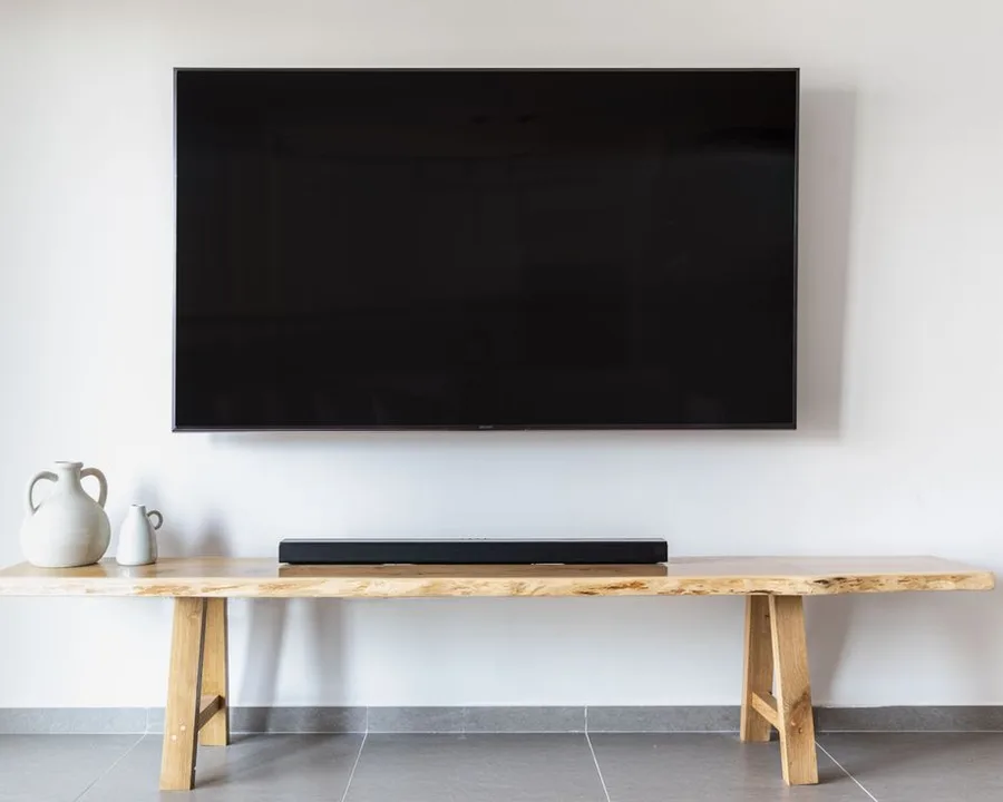 Wall-mounted flat-screen television in a modern living room